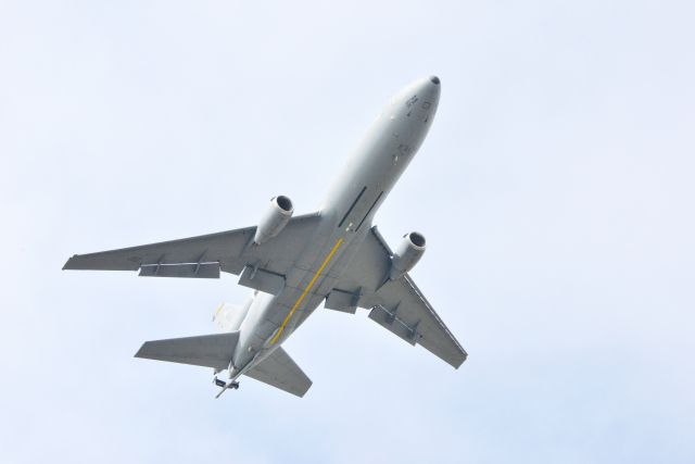 N91712 — - Departing Gander Airport for the Azores.  Under carriage shows the pod system which reels out the hose to refuel other aircraft in flight.