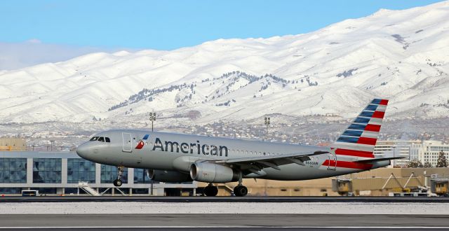 Airbus A320 (N660AW) - One of the smoothest touchdowns I've ever seen -- there is only a faint bit of smoke as the rubber meets the concrete when the pilots of AAL's N660AW complete a morning flight from Phoenix.