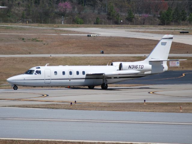 IAI 1124 Westwind (N316TD) - TOMLINSON DANIEL LLC taxiing to Signature Aviation at KPDK - 4/6/13