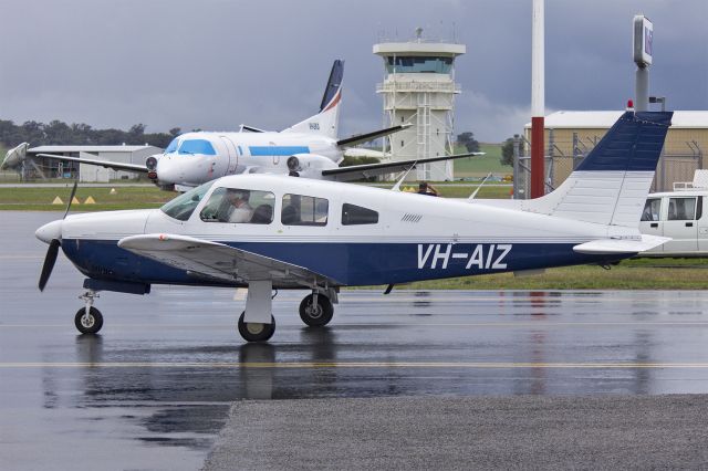 Piper Cherokee Arrow (VH-AIZ) - Piper PA-28R-201 Cherokee Arrow III (VH-AIZ) taxiing at Wagga Wagga Airport.
