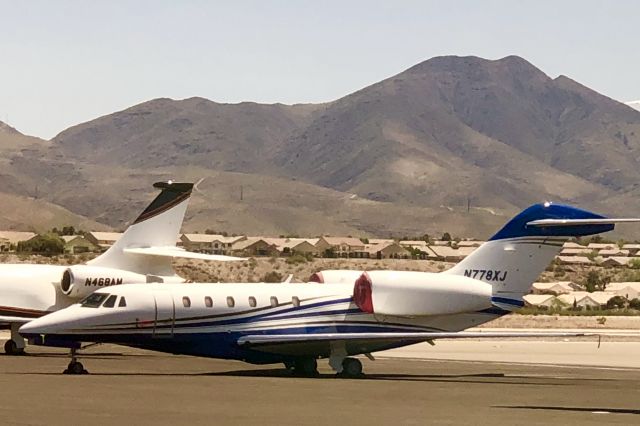 Cessna Citation X (N778XJ) - Mountain shrouded ramp at KHND. Getting ready to zoom to Florida 