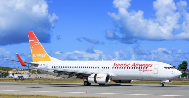 Boeing 737-800 (OK-TVP) - Sunrise airways landing at TNCM St Maarten.