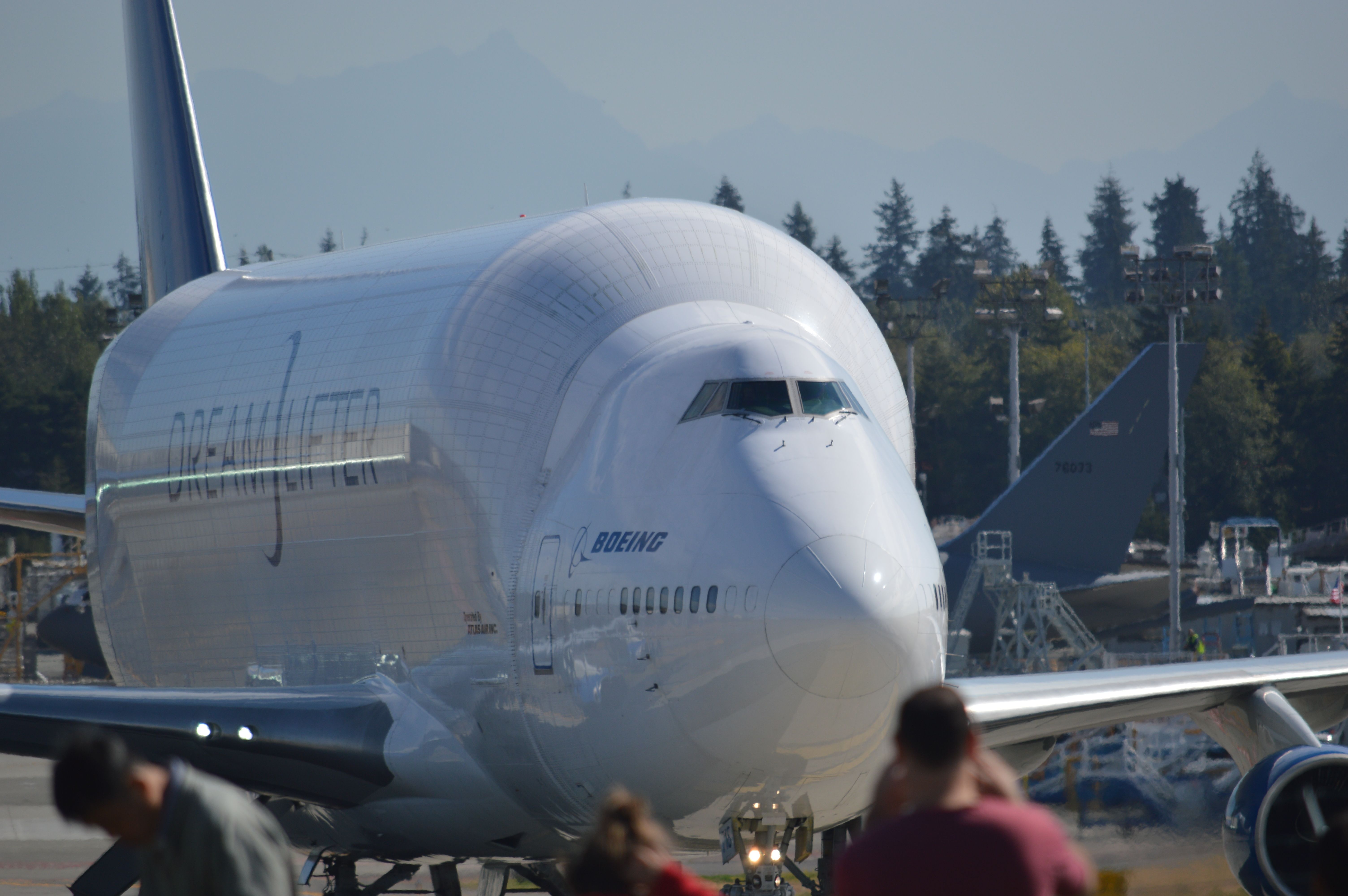 — — - Paine Field bringing in Dreamliner fuselage.