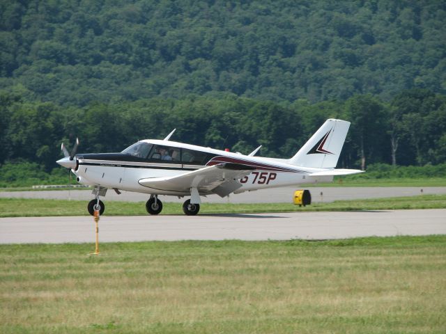 Piper PA-24 Comanche (N7675P) - Nosewheel is just about to touch down on rollout after landing at Williamsport for the 2009 WRAP Pancake Breakfast.