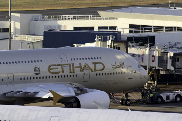 Airbus A380-800 (A6-APC) - Preparing for pushback, the photo was taken from level 12 of the international carpark at YSSY