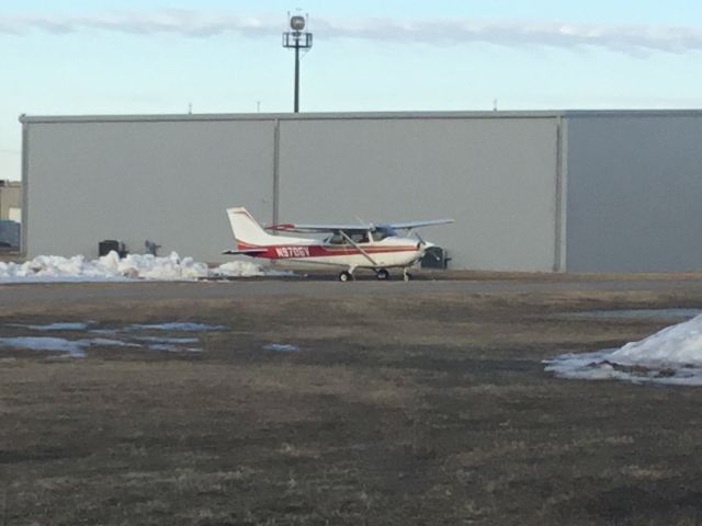 Cessna Skyhawk (N9706V) - Standing by the FBO parking lot of Airlake on 4 March, 2021. 5:05 PM CST