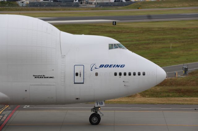 Boeing 747-400 (N718BA) - Dreamlifter 718 taxiing by with some 787 parts. Jun 18th 2019.