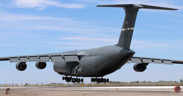 LOCKHEED C-5 Super Galaxy (87-0044) - Lots of rubber is about to kiss the concrete as this Super Galaxy is mere seconds away from touching the mains on to  NAS Fallon's runway 31L.