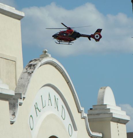 Eurocopter EC-635 (N135CH) - 3/22/22 inbound to Orlando Health behind the Amtrak station