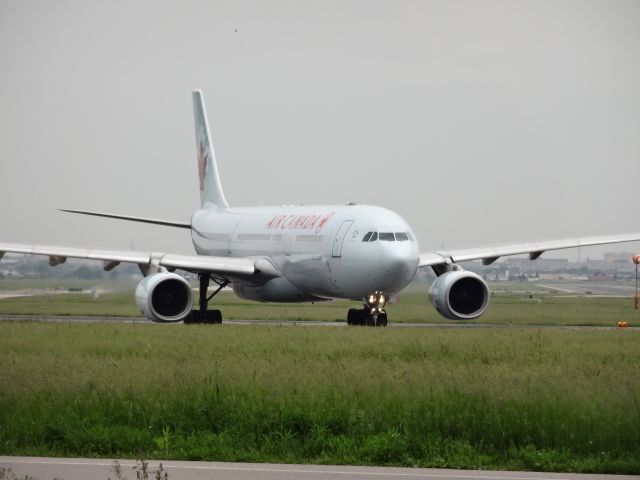 Airbus A330-200 — - Another close-up of this guy about to depart!