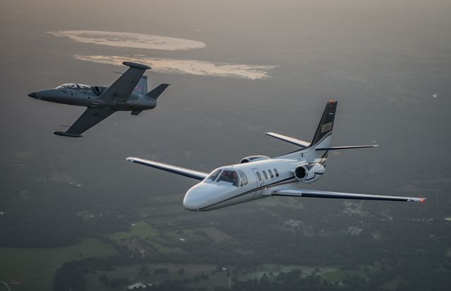 Cessna 500 Citation 1 (N1TW) - L-39 breaking formation with Citation. photo by Glenn Watson Mach Point One Aviation