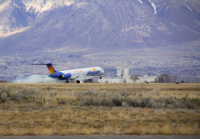 McDonnell Douglas MD-80 (N868GA) - Smokin the mains landing in OGD.