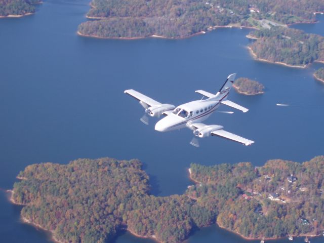 Cessna 421 (N344TC) - Another view of N344TC over Lake Lanier.  Moving into position for Air to Air photo shoot.