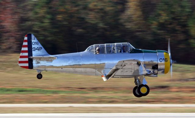 North American T-6 Texan (N94444) - A North American AT-6A  lifts off runway 31 at Falcon Field in Peachtree City, Ga. N94444 is in in the inventory of the CAF Dixie Wing based here.