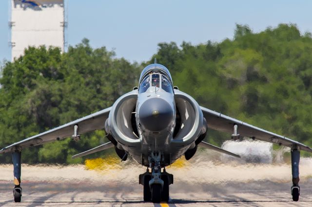 Boeing Harrier (N94422) - Harrier jump jet throttling up for a vertical departure. Questions about this photo can be sent to Info@FlewShots.com