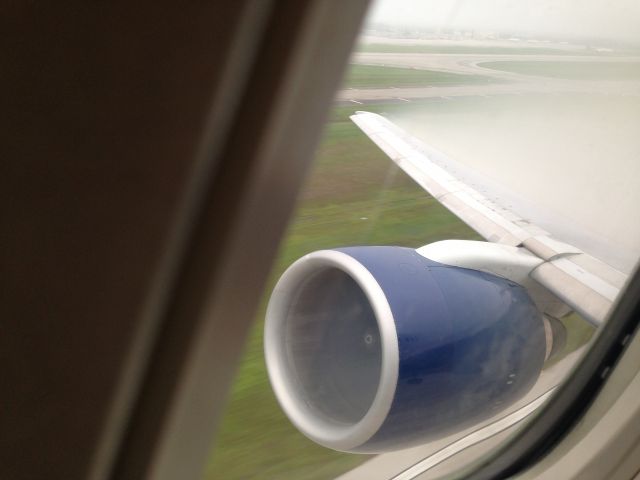 Boeing 757-200 (N644DL) - Storming out of Orlando on a very wet morning.