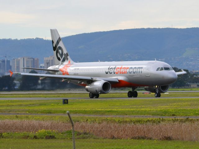 Airbus A320 (VH-VQF) - On taxi-way heading for take off on runway 05. Thursday 12th July 2012.