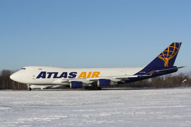 Boeing 747-400 (N475MC) - Departing CYXU London Intl Airport,London,Ontario,Canada March 13,2014 to Keflavik BIKF/KEF