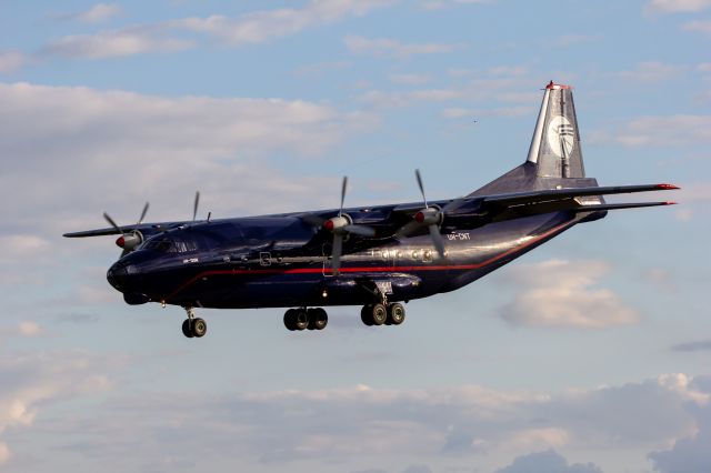 Antonov An-12 (UR-CNT) - UKL5010 on final for the former 5L at Willow Run.