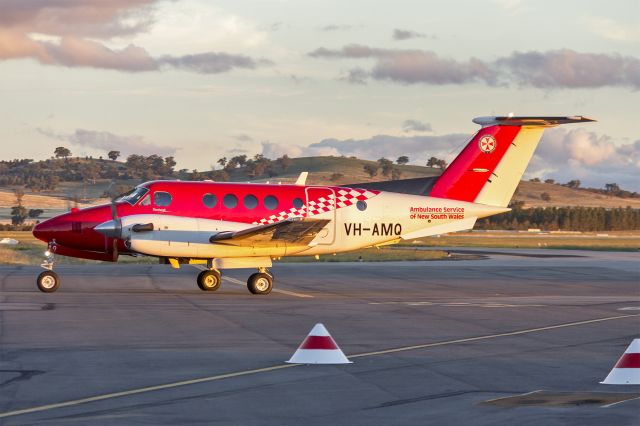 Beechcraft Super King Air 200 (VH-AMQ) - Royal Flying Doctor Service, contracted to service fix wing operations for the NSW Ambulance Service, (VH-AMQ) Raytheon Beech Super King Air B200C taxiing at Wagga Wagga Airport.