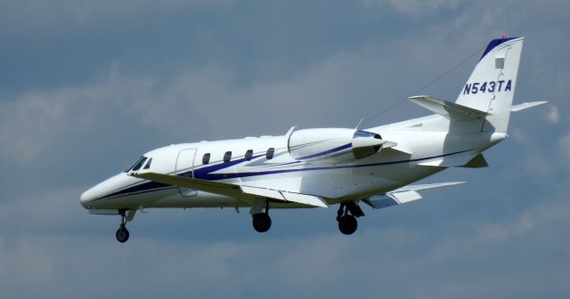 Cessna Citation Excel/XLS (N543TA) - About to touch down is this 2003 Cessna 560XL Citation Excel in the Summer of 2023.