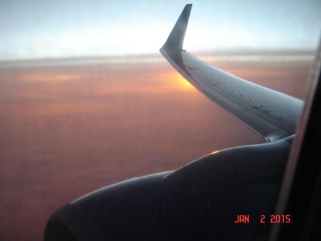 Boeing 737-700 (N7721E) - C/N 34479 Sunset at 39,000 ft 447 knots KLAX-KMCO SWA 467