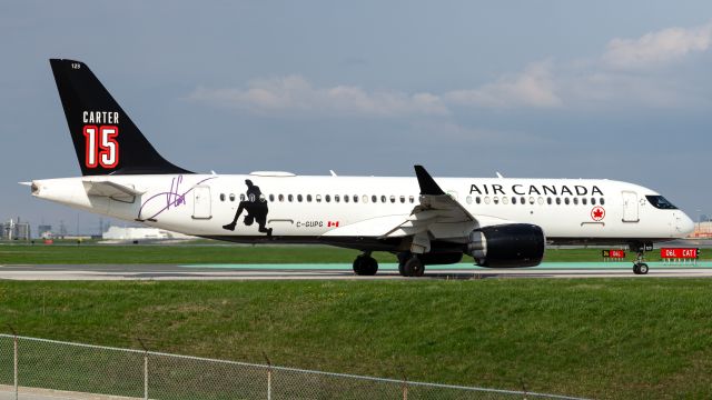 OSKBES-MAI Kityonok (C-GUPG) - This Air Canada Airbus A220-300 sporting the Vince Carter livery is holding short of Runway 06L for its eventual 52-minute flight to Montreal. Photo taken May 07, 2025.