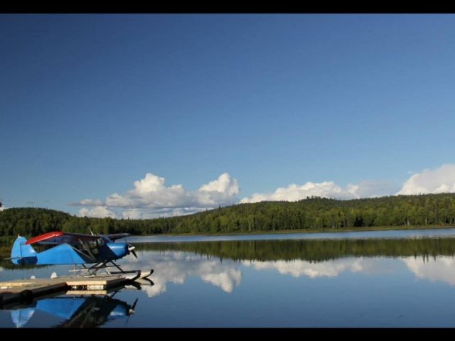 — — - Warm summer day in 2014 on Lake Christiansen near Talkeetna, Alaska. Piper Tri-pacer 