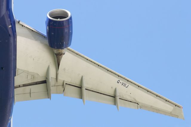 Boeing 777-200 (G-VIIJ) - Starboard GE90 engine and wing of a B777-200A.