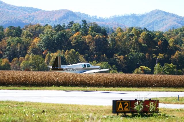 Mooney M-20 (N6778U) - My wife took this photo of me taking off from Andrews-Murphy in North Carolina.