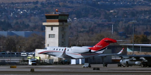 Cessna Citation X (N750EC) - A Cessna Citation (N750EC) has already put the tread to bed as it rockets past while making a morning departure.