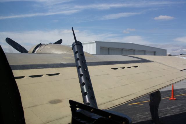 — — - B17 right-hand-Side 50Cal Gunner view