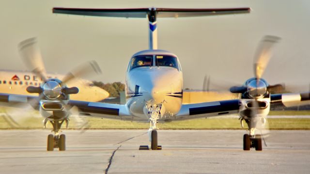 Beechcraft Super King Air 350 (N701FC) - Fargo Jet Center’s B350 getting ready to head back home after the ISU v. NDSU game.br /br /(ft. NDSU’s charter on takeoff roll in the background)br /br /This aircraft is a 2000 Beechcraft 300 Super King Air 350, SN FL-291, owned/operated by Fargo Jet Center. 10/8/22. 