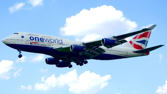 Boeing 747-400 (G-CIVI) - Just before landing on runway 27R. A cloud came over just as I took this photo, so I had to do some color corrections which is why it looks a bit off.