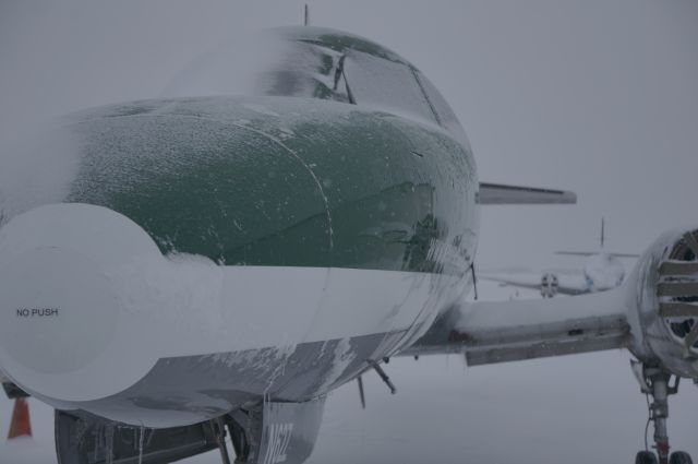 Fairchild Dornier SA-227DC Metro (N62Z) - Strong snow storms back drop a dying turbo-beast.