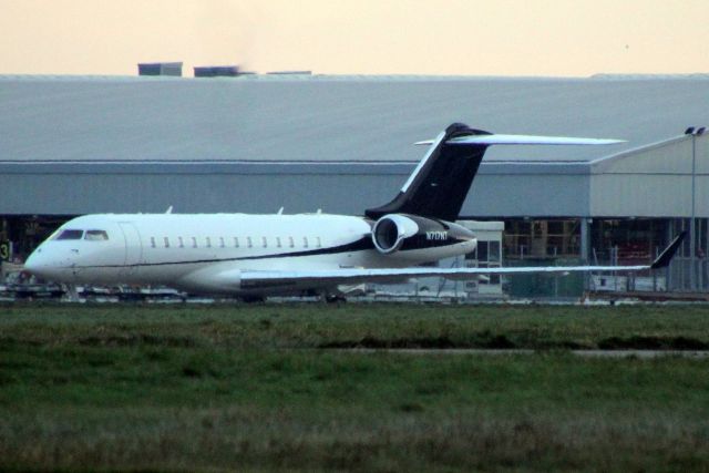 Bombardier Global Express (N717NT) - Parked on Stand 604 on 17-Dec-22.