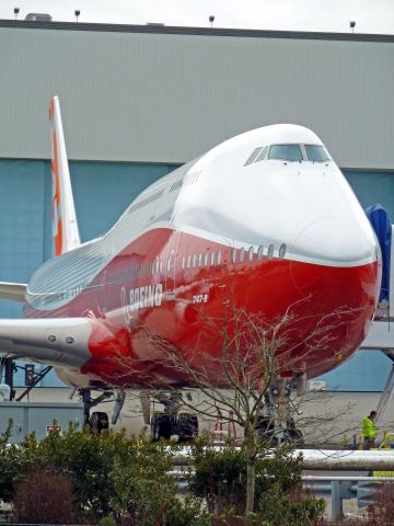 N6067E — - OLL OUT SERIES #9:  Boeing 747-8 Intercontinental RC001 Business Jet for undisclosed government  customer being PARKED in front of the Boeing paint hangar on 2-13-2011 roll-out day at Paine Field, Everett, Washington -- roll-out complete  ||||   Photo by Bruce McKinnon