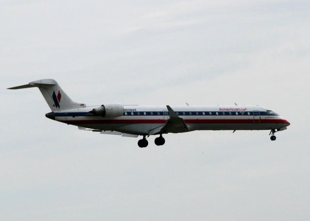 Canadair Regional Jet CRJ-700 (N508AE) - Landing on 18R at DFW. A rainy, overcast day!