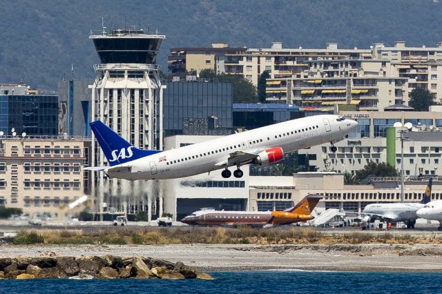 BOEING 737-600 (LN-BRI) - SAS Boeing 737 LN-BRI departing Nice, South of France - image taken RAW from approx 1 mile from a motor yacht heavily cropped  Canon 5 MkIII 70-200 2.8 - reg can be read clearly F5.6/1000th sec - hope you agree a classic image