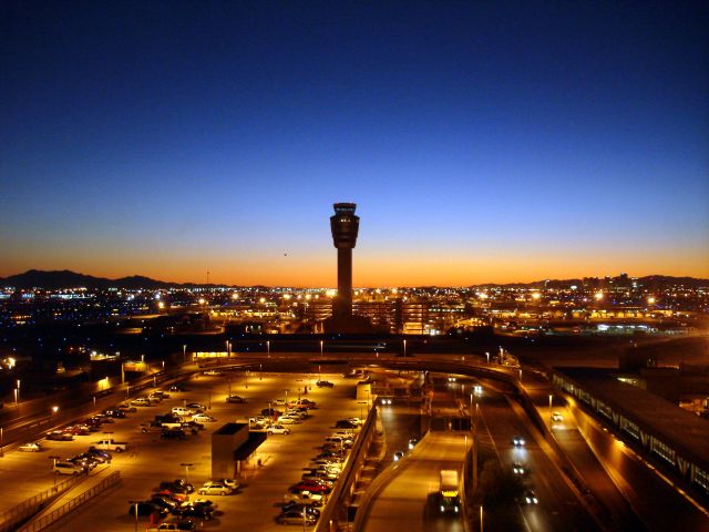 — — - Beautiful sunset at KPHX , seen from T4 parking.