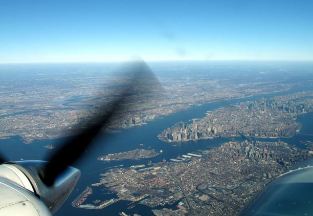 N8111M — - Over Mahattan, VFR en-route to Danbury. RELIANT AIR has the lowest fuel price on the Danbury (KDXR) airport.