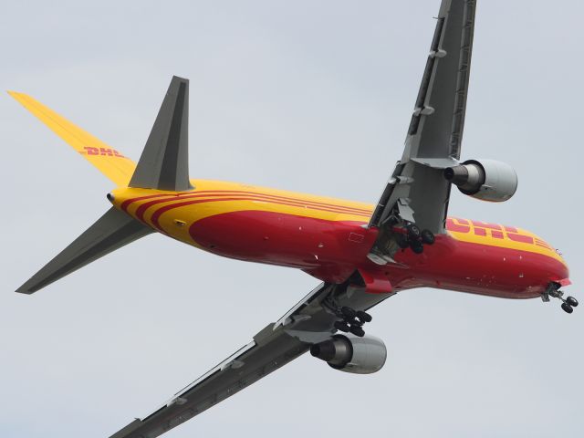 G-DHLF — - The DHL B767-336ER rolls left and gains height, after performing a slow speed wheels down fly past at RIAT 2012.