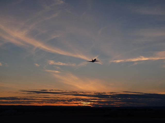 — — - Sunset at PDX