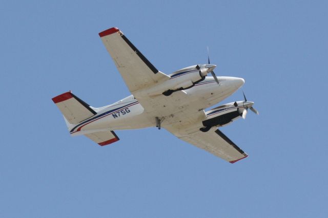 Beechcraft King Air 90 (N75G) - N75G departs Runway 14 at Sarasota-Bradenton International Airport