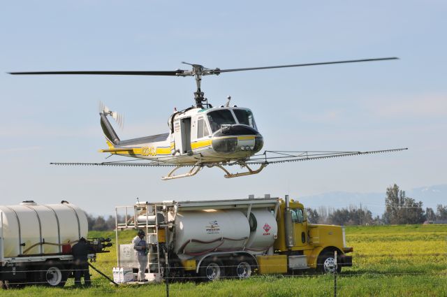 N234SJ — - Spraying almonds, Glenn Co. CA