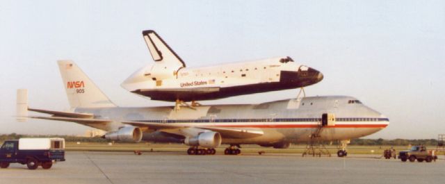 N905 — - I worked over on the other side of the flightline ("Security Hill"), but drove down to the transient ramp to shoot this photo of the Challenger making a halfway stop at Kelly (San Antonio) on its way back to Cape Kennedy, having landed at Edwards AFB, California, following a 'routine' shuttle mission, sometime around 1984/1985. From Kelly, I transferred to Scotland in 1985, and was on Ops Officer duty at a USAF Space Operations ground station the morning we lost the Challenger. My ground station was always the first site to verify telemetry from every shuttle launch. That morning, we watched our computers drive the attenas to the exact horizon bearing to pick up Challenger as it should have appeared. Watched and waited, that is, until informed to "Stand down... Challenger is lost."