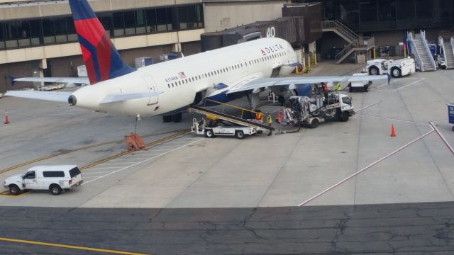 Airbus A320 (N374NW) - Passing by on AirTrain.  The plane arrived from SLC and was going to return.