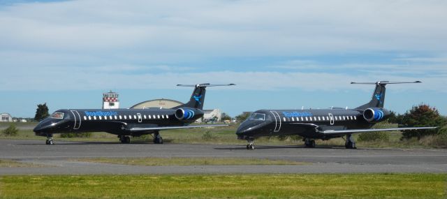 Embraer ERJ-145 (N835HK) - On the right side catching some tarmac time is a RoadRunAir 2003 Embraer ERJ-145LR in the Autumn of 2022. N832HK a similar aircraft is on the rigft.