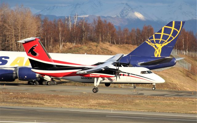 de Havilland Dash 8-100 (N880EA) - A windy afternoon made for some interesting landings on runway 15 at ANC on this day.