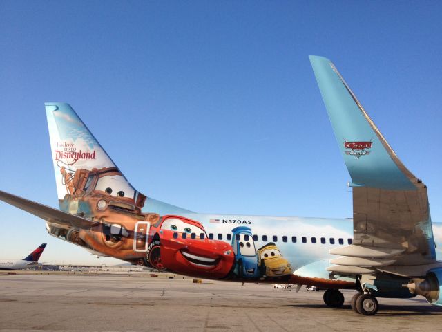 Boeing 737-700 (N570AS) - The Cars parked in the impound area.